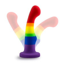 Load image into Gallery viewer, Side view of the blush Avant Pride Freedom Plug, placed on its suction cup, visualizing the flexibility of the product.