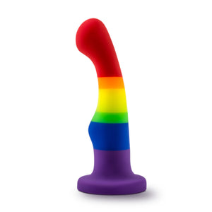 Side view of the blush Avant Pride Freedom Plug, placed on its suction cup.