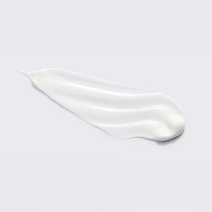 A smooth, silky swatch of white Beaver Butter Stimulating Arousal Serum against a neutral background, highlighting its creamy, water-based texture.