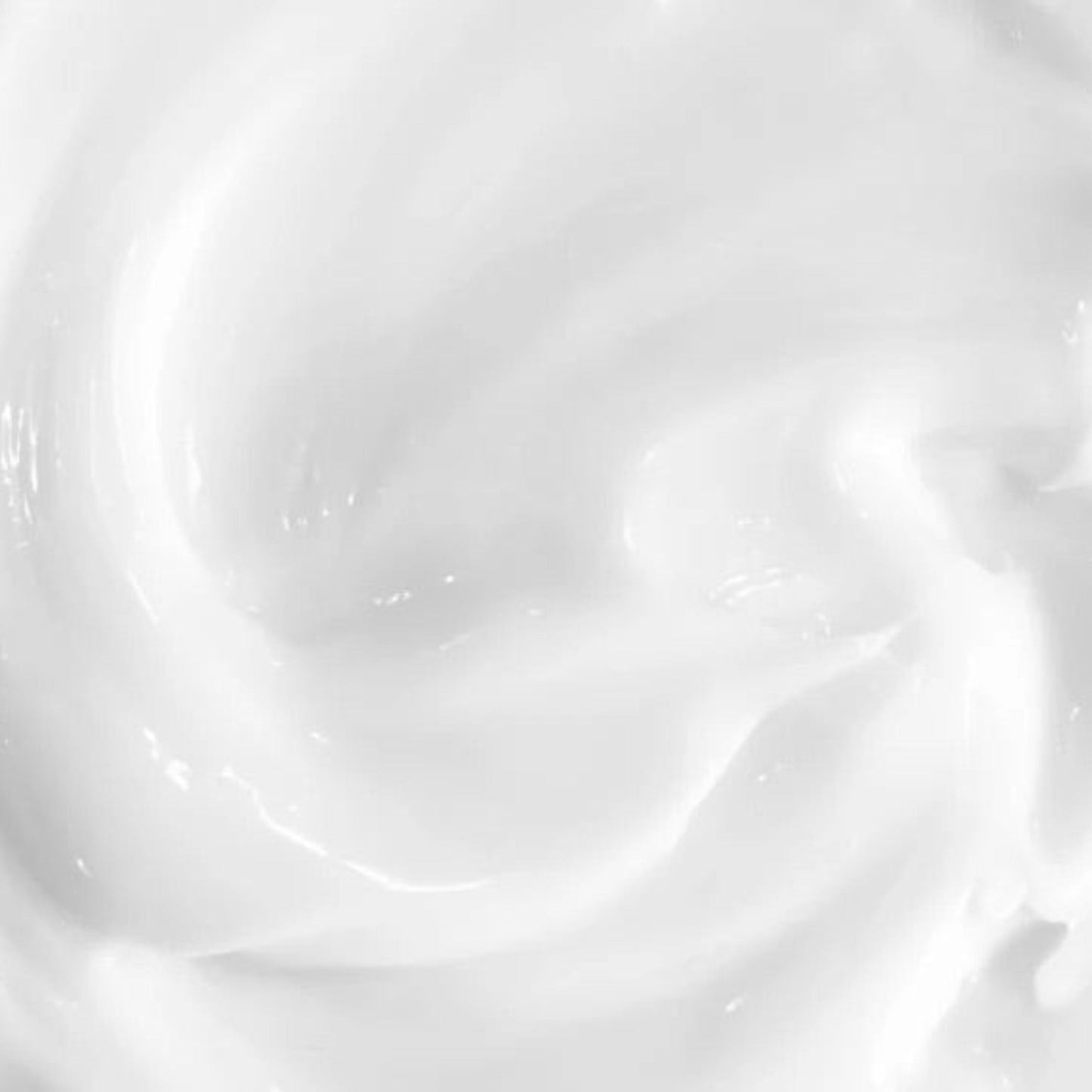An artistic close-up swirl of the Beaver Butter vulva serum, showcasing its rich, hydrating consistency and smooth application.