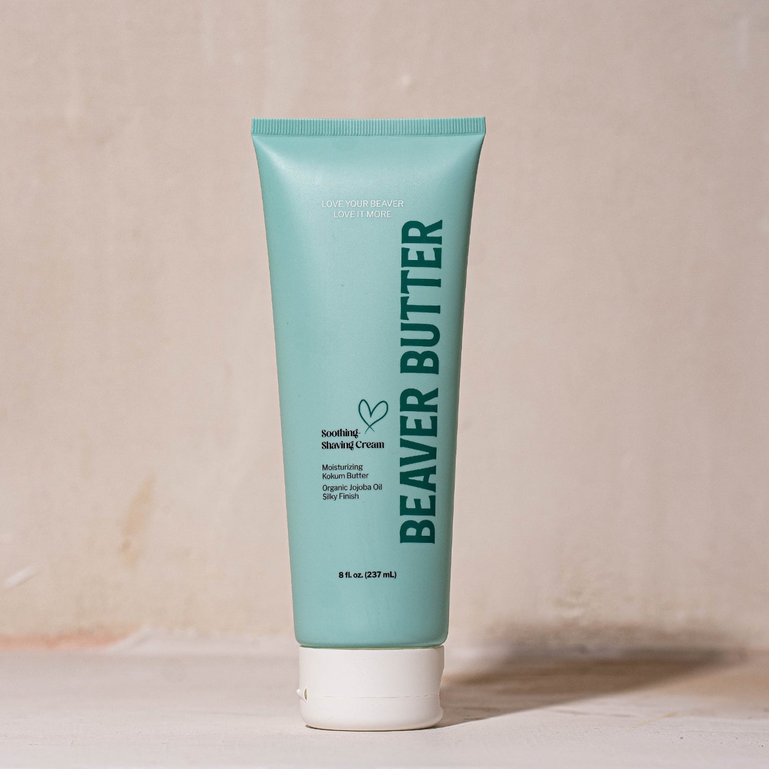 Front view of the 237ml / 8 fl. oz Beaver Butter Soothing Shaving Cream tube, emphasizing Kokum Butter and Jojoba Oil ingredients.