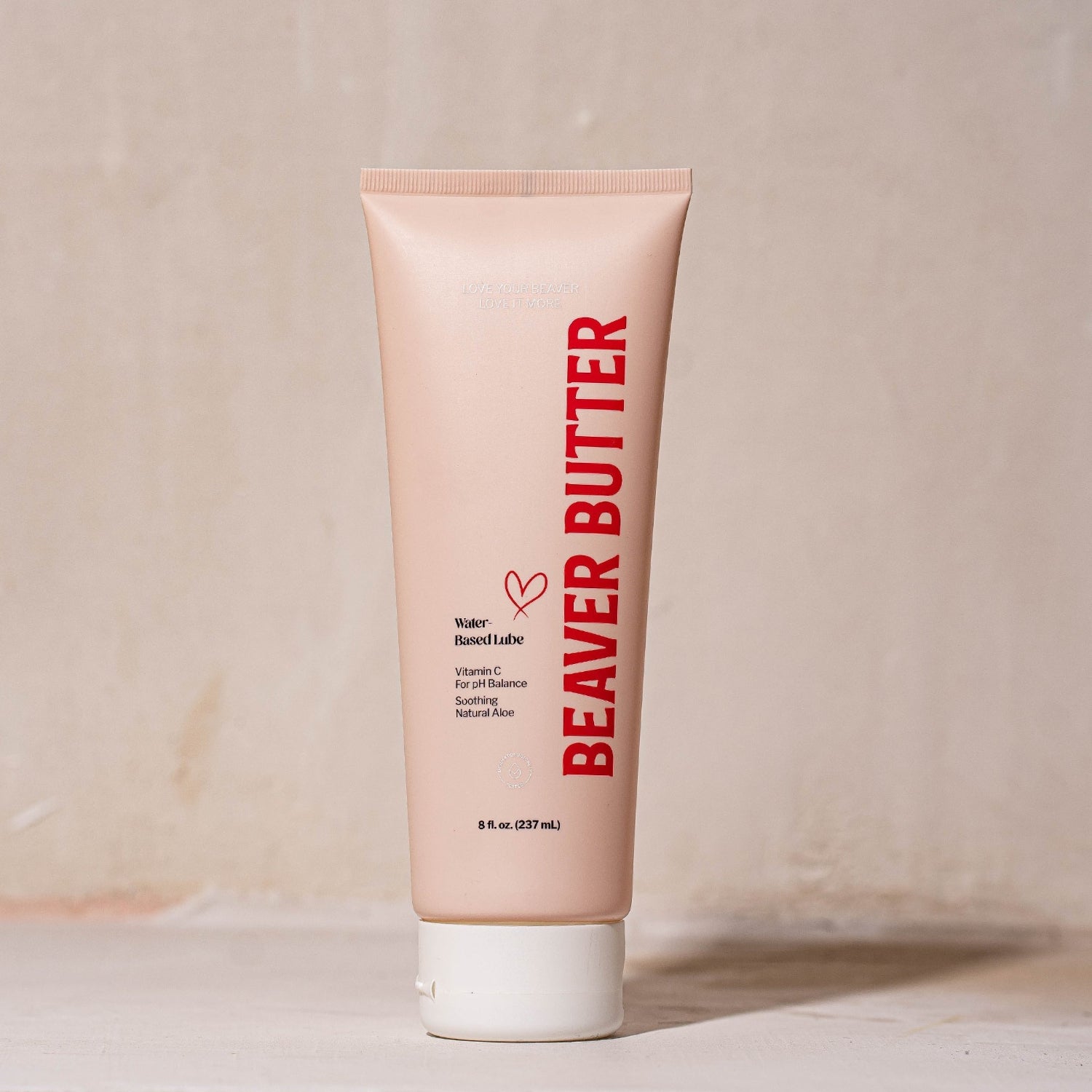 Studio shot of the 237 mL / 8 oz Beaver Butter water-based lubricant tube showing the flip-top cap and sleek branding.