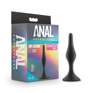 On the left side of the image is the product packaging. On the left side of packaging is the Anal Adventures logo. On the front of the packaging is the Anal Adventures Platinum logo, product name: 100% silicone Beginner Plug Small, product feature icons for: Ultrasilk silicone; Plug .75" width, in the middle is a side image of the product standing on its base, and the blush logo in the bottom left. Beside the packaging is the product standing on its base.