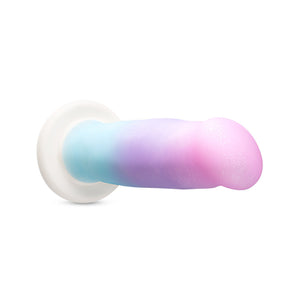 Front side of the blush Avant Lucky Dildo