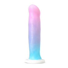 Load image into Gallery viewer, Bottom side of the blush Avant Lucky Dildo, placed on its suction cup.