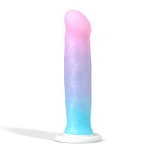 Load image into Gallery viewer, Side of the blush Avant Lucky Dildo, placed on its suction cup.