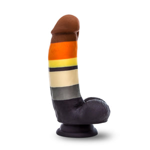 Side view of the blush Avant Pride Bear Realistic Dildo, placed on its suction cup.