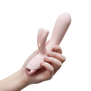 Blush Elora Personal Massager being held in the a woman's hand, showing the size scale of the product.