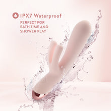 Load image into Gallery viewer, Feature icon for IPX7 Waterproof: Perfect for Bath time and shower play. An image of the Blush Elora Personal Massager with splash effects around the product.