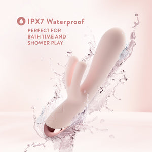 Feature icon for IPX7 Waterproof: Perfect for Bath time and shower play. An image of the Blush Elora Personal Massager with splash effects around the product.