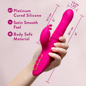 Feature icons for: Platinum cured silicone; Satin smooth feel; Body safe material. On the image is a closeup of a woman's hand holding the Blush Kira Rabbit Vibe, showing the size scale of the product, and measurements displayed around the product: Insertable length: 12.7 centimetres / 5 inches; Width: 3.2 centimetres / 1.25 inches; Product's length: 24.1 centimetres / 9 inches.