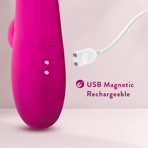 Close up image of the Blush Kira Rabbit Vibe's Magnetic charging port with the charging cable stretched beside. Feature icon for: USB Magnetic Rechargeable.