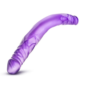Top side view of the blush B Yours 14 Inch Double Dildo, bent in the middle demonstrating product flexibility.
