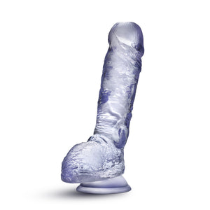 Bottom side view of the blush B Yours Plus Heart N' Hefty 9 Inch Dildo, placed on its suction cup.