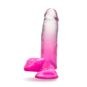 Bottom side of the blush B Yours Sugar Magnolia 7 Inch Dildo, placed on its suction cup.