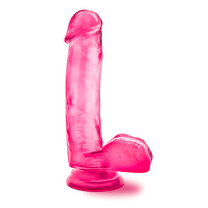 Side view of the blush B Yours Sweet N' Hard 1 Realistic Dildo, placed on its suction cup.