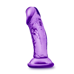 Bottom side view of the blush B Yours Sweet 'N Small 4 Inch Dildo, placed on its suction cup.