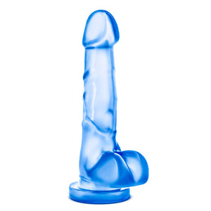 Bottom side view of the blush B Yours Sweet 'n Hard 4 Realistic Dildo, placed on its suction cup.