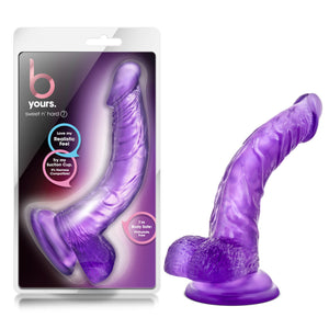 On the left side of the image is the product packaging. On the product packaging is b yours. logo , sweet 'n hard 7 (product name), and text bubbes pointing to the product inside the packaging: "Love my realistic feel"; Try my suction cup It's harness compatible"; "I'm body safe: Phthalate free". Beside is the product "blush B Yours Sweet 'N Hard Realistic Dildo". On the right side of the image is the product  blush B Yours Sweet 'N Hard Realistic Dildo, placed on its suction cup.