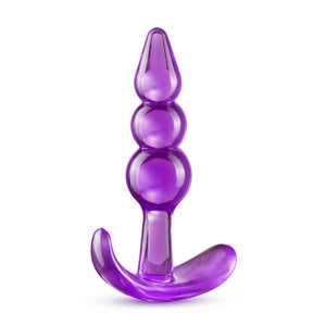 Top side of the blush B Yours Triple Bead Anal Plug, placed on its suction cup.