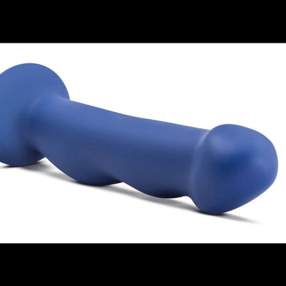 Angled top view of the Avant Suko Indigo D12 dildo displaying the tapered head and contoured shaft curves.