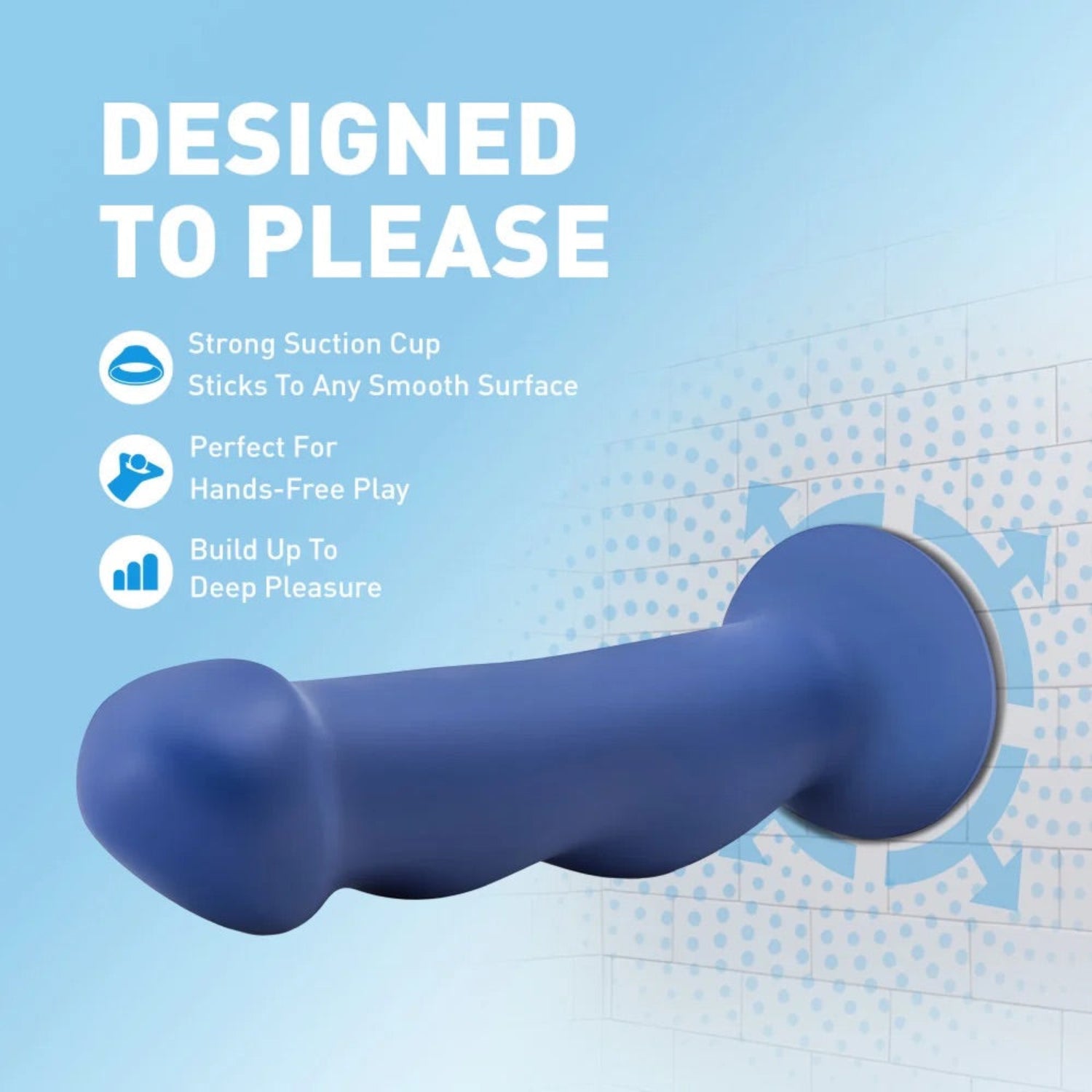 Blue Avant Suko dildo suctioned securely to a tiled bathroom wall illustrating hands-free play under "Designed to Please".
