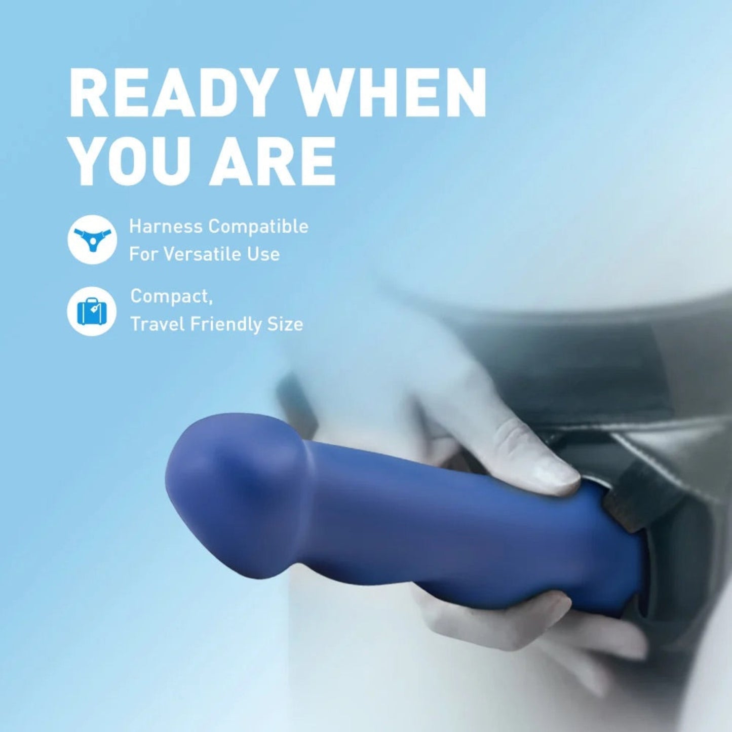 Hand holding the blue Avant Suko dildo secured inside a black leather strap-on harness under "Ready When You Are".