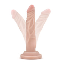 Load image into Gallery viewer, An illustration of blush Dr. Skin 5&quot; Mini Cock showing the flexibility of the product, placed on its suction cup.