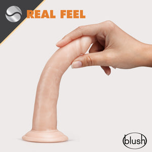 An icon for Real feel. blush Dr. Skin Glide 7.5 Inch Self Lubricating Dildo placed on its suction cup, with a female hand bending the product backwards. On the bottom right is the blush logo.