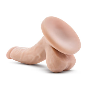 Back side view of the blush Dr. Skin 4" Mini Cock Realistic Dildo