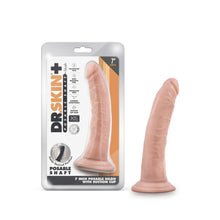 Load image into Gallery viewer, Left side of image is product packaging. On packaging is Dr. Skin + logo, Posable Shaft by blush, product feature icons for: Fragrance free; Soft realistic feel; Phthalate free; Harness compatible; Suction Cup Base; X5 Superior TPE; Laboratory certified - Body safe; Holds Desired position Posable Shaft, product name below: 7 Inch Posable Dildo with Suction cup, top right: 7&quot; length, and product visible through clear packaging. Beside package is product blush Dr. Skin Plus 7 Inch Posable Dildo.