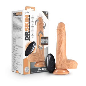Side view of packaging. Front of packaging has blush & Dr. Skin Silicone logos, feature icons for: 7 vibrating functions; Remote control; Ultrasilk silicone; Rechargeable; IPX6 splashproof; Body safe; Laboratory certified body safe; Powerful thrusting gyrating vibrations, top right: 7" length, middle an illustration of product, with arrows showing product movements, controller to the left, and bellow "Dr. Grey 7 Inch Thrusting, Gyrating, Dildo with Remote Control". With product, and controller