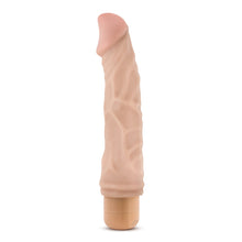 Load image into Gallery viewer, Side view of the blush Dr. Skin 22 cm / 8.75&quot; Cock Vibe 6, standing on it&#39;s base.