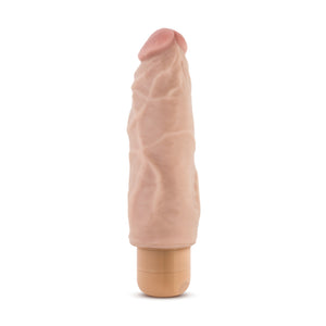 Bottom side of blush Dr. Skin 17 cm / 7" Cock Vibe 9, placed on its base.
