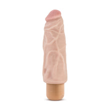 Load image into Gallery viewer, Side view of the blush Dr. Skin 17 cm / 7&quot; Cock Vibe 9, placed on its base.