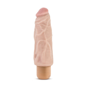 Side view of the blush Dr. Skin 17 cm / 7" Cock Vibe 9, placed on its base.