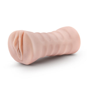 Front side view of the blush EnLust Ayumi Stroker laying on its side.