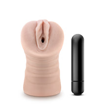 Load image into Gallery viewer, Front side view of the blush EnLust Ayumi Stroker standing on its back with the bullet vibe standing beside the stroker.