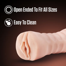 Load image into Gallery viewer, An image of the blush EnLust Destini Vibrating Stroker facing front laying on its side. On the top are feature icons for; Open Ended to fit all sizes; Easy to clean.