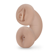Load image into Gallery viewer, Side view of the blush Enlust Tasha Soft and Wet Glow In The Dark Stroker bent in half showing both ends of the stroker.