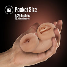 Load image into Gallery viewer, A computer generated image of a male&#39;s hand holding the blush Enlust Tasha Soft and Wet Glow In The Dark Stroker in his palm, that&#39;s bent in half showing both ends of the stroker. On the top of the image is a feature icon for &quot;Pocket Size: 5.25 inches / 13.3 centimetres&quot;.