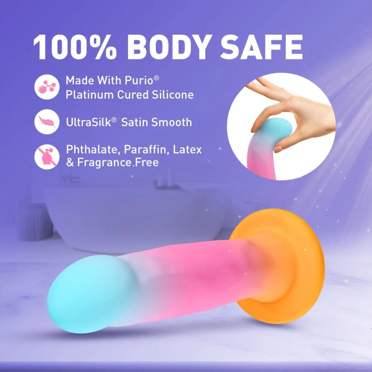 Hand flexing the tip of the Avant Golden Dawn pastel dildo demonstrating soft, body-safe Purio liquid silicone flexibility.