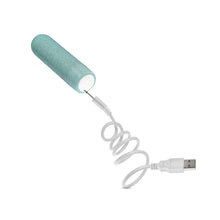 Load image into Gallery viewer, Back side of the blush Gaia Eco Rechargeable Bullet, with a USB charging cable to the right of the product.