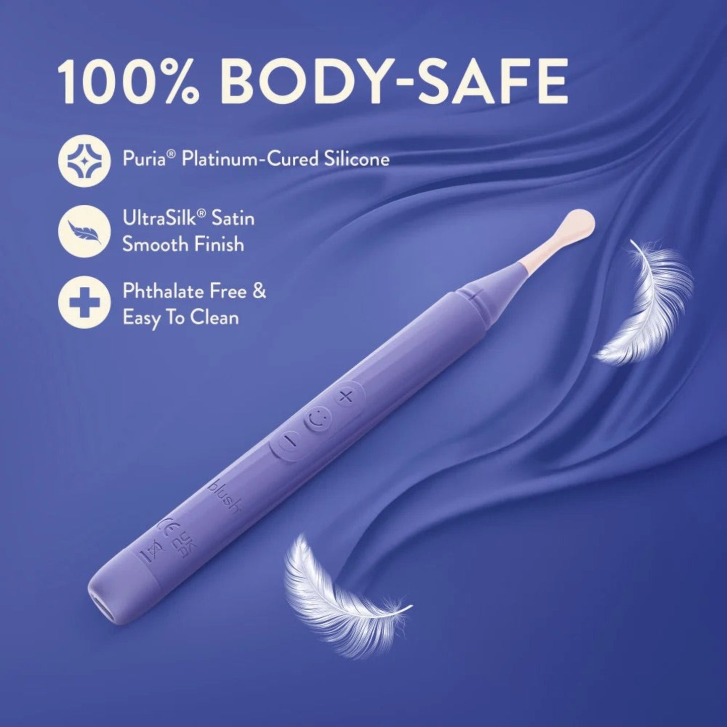 Blush Juno purple vibrating wand resting on soft silk fabric highlighting body-safe Puria platinum silicone and UltraSilk satin finish.