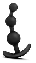 Load image into Gallery viewer, Bottom side view of the  blush Luxe Be Me 3 Silicone Anal Beads, standing on its ez-handle.