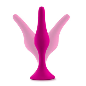 Side view of the blush Luxe Beginner Plug, standing from its base, and an illustrated image of its shaft bending in 2 separate directions, indicating the flexibility of the product.