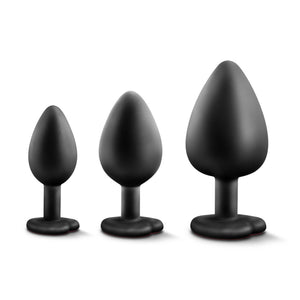 Side view of the blush Luxe Bling Plugs Trainer Kit, standing beside each other from small to large.