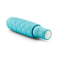 Load image into Gallery viewer, Back side view of the blush Luxe Cozi Mini Aqua Vibrator, with the power button visible at the base of the product.