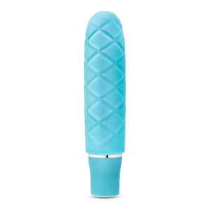 Side view of the blush Luxe Cozi Mini Aqua Vibrator, standing up on its base.