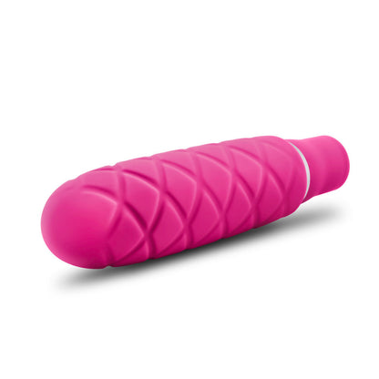 Back side view of the blush Luxe Cozi Mini Faschia Vibrator, with the power button visible at the base of the product.